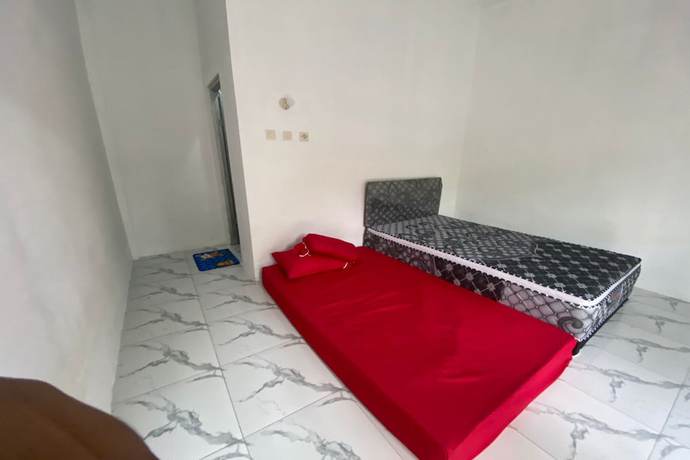 Imagen de la habitación del Hotel OYO 93440 Warde Hotel Near Sae Restaurant. Foto 15