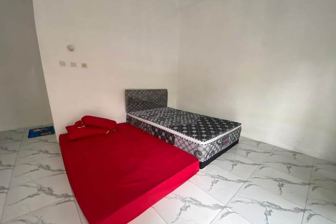Imagen de la habitación del Hotel OYO 93440 Warde Hotel Near Sae Restaurant. Foto 16