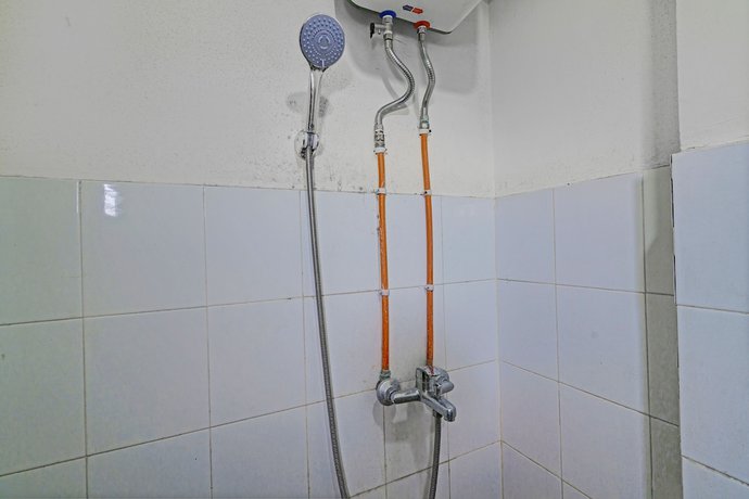 Imagen de la habitación del Hotel OYO 93456 Gateway Cicadas By Inpro Ii. Foto 14