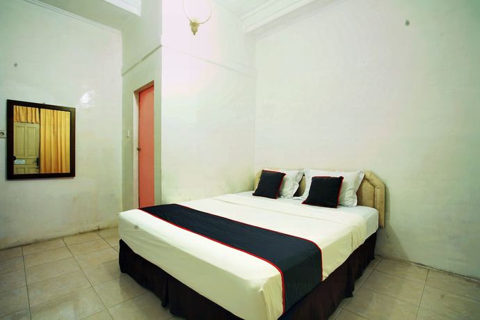 Imagen de la habitación del Hotel OYO 93467 Wisma Olo Syariah. Foto 7