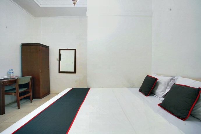 Imagen de la habitación del Hotel OYO 93467 Wisma Olo Syariah. Foto 8