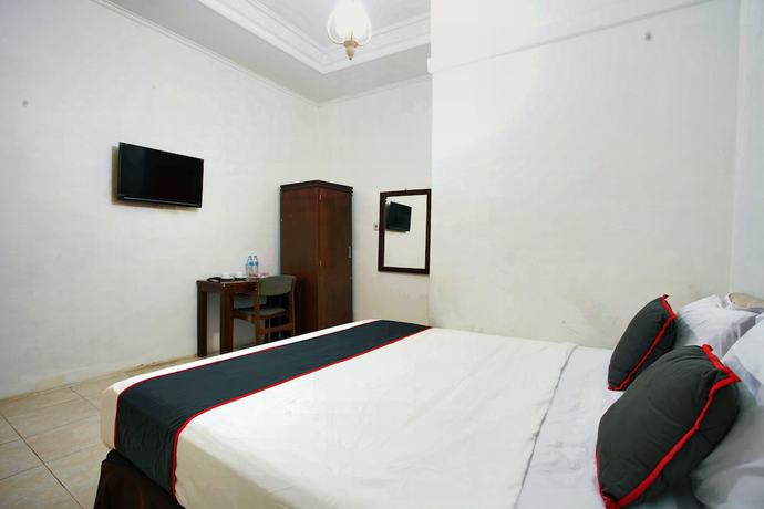 Imagen de la habitación del Hotel OYO 93467 Wisma Olo Syariah. Foto 15
