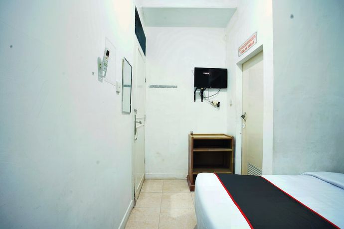 Imagen de la habitación del Hotel OYO 93467 Wisma Olo Syariah. Foto 16