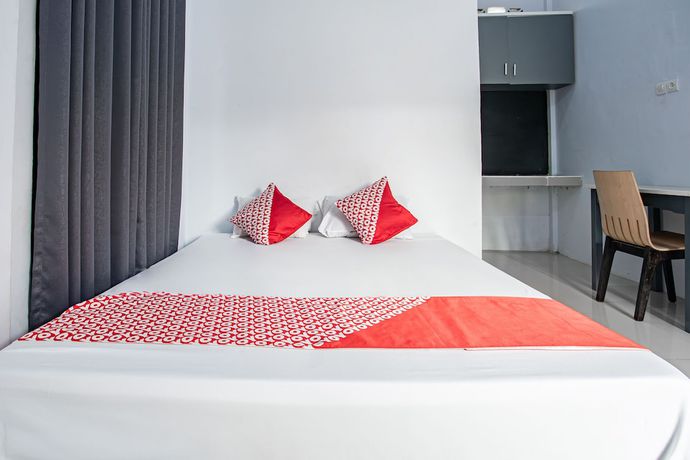 Imagen de la habitación del Hotel OYO 93476 Owo Guest House Syariah. Foto 2