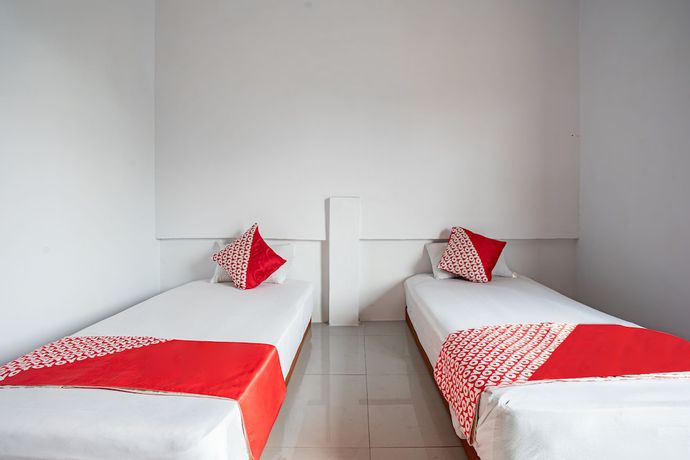 Imagen de la habitación del Hotel OYO 93476 Owo Guest House Syariah. Foto 15