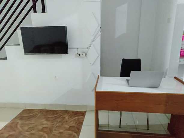 Imagen de los interiores del Hotel OYO 93476 Owo Guest House Syariah. Foto 20