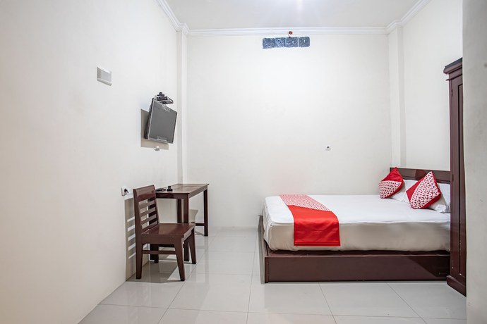 Imagen de la habitación del Hotel OYO 93477 Almahyra Guest House Syariah. Foto 4