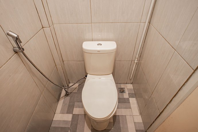 Imagen de la habitación del Hotel OYO 93477 Almahyra Guest House Syariah. Foto 7