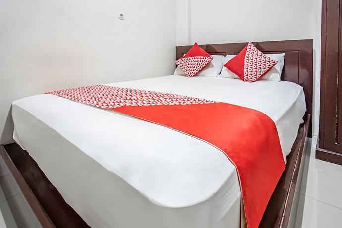 Imagen de la habitación del Hotel OYO 93477 Almahyra Guest House Syariah. Foto 9