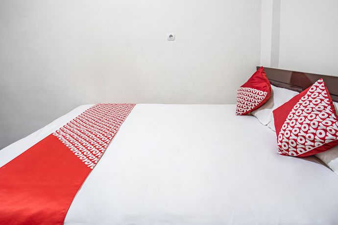 Imagen de la habitación del Hotel OYO 93477 Almahyra Guest House Syariah. Foto 10