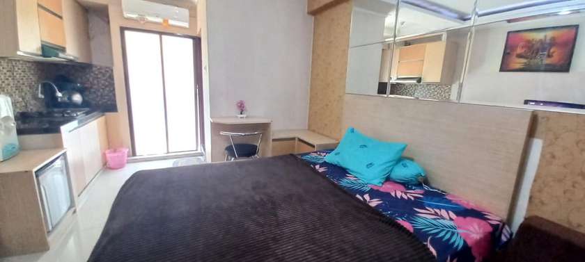 Imagen de la habitación del Hotel OYO 93480 Apartement Gateway Cicadas By. Foto 4