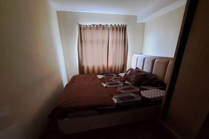 Imagen de la habitación del Hotel OYO 93481 Apartement Grand Asia Afrika. Foto 4
