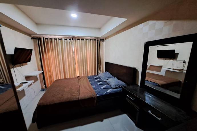 Imagen de la habitación del Hotel OYO 93481 Apartement Grand Asia Afrika. Foto 6