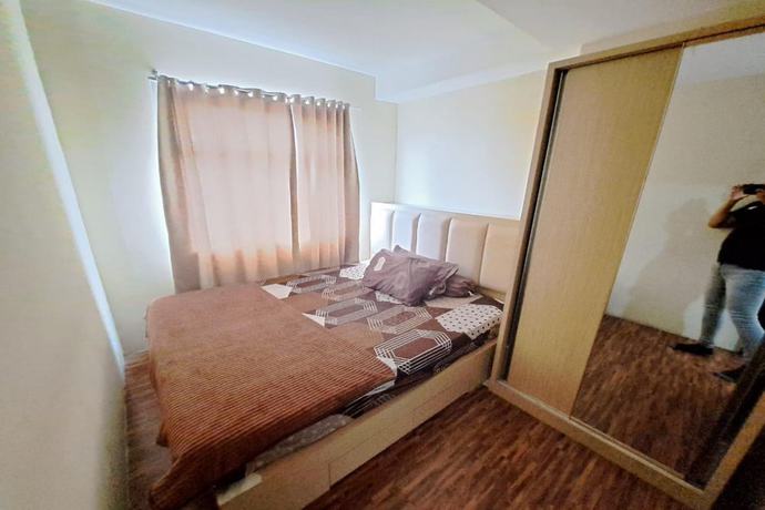 Imagen de la habitación del Hotel OYO 93481 Apartement Grand Asia Afrika. Foto 7