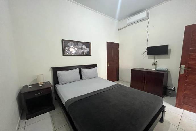 Imagen de la habitación del Hotel OYO 93482 Penginapan Tenang Lovina. Foto 3