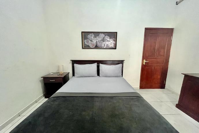 Imagen de la habitación del Hotel OYO 93482 Penginapan Tenang Lovina. Foto 4