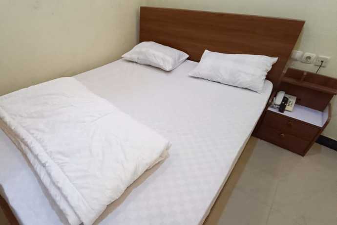 Imagen de la habitación del Hotel OYO 93507 Saril Riverside Homestay. Foto 4
