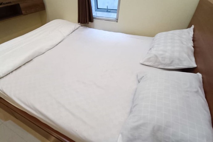 Imagen de la habitación del Hotel OYO 93507 Saril Riverside Homestay. Foto 5