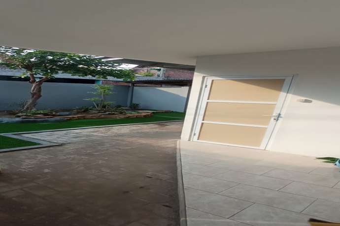 Imagen de los exteriores del Hotel OYO 93526 Homely Syariah. Foto 10