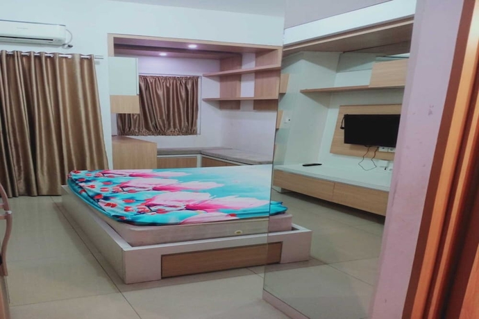 Imagen de la habitación del Hotel OYO 93543 Belmount Residence By Tos. Foto 4