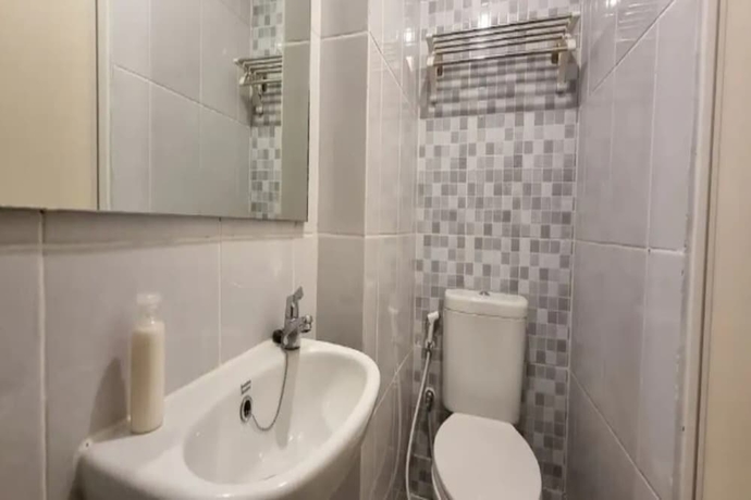 Imagen de la habitación del Hotel OYO 93543 Belmount Residence By Tos. Foto 9