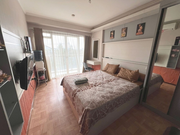 Imagen de la habitación del Hotel OYO 93559 Apartemen Gateway Pasteur By Erik. Foto 10
