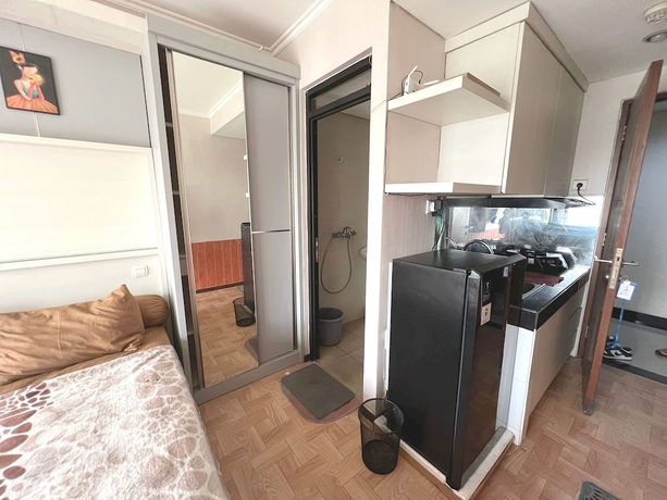 Imagen de la habitación del Hotel OYO 93559 Apartemen Gateway Pasteur By Erik. Foto 11