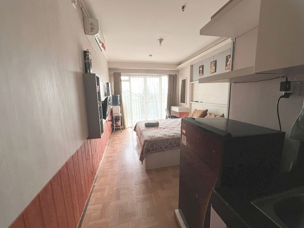 Imagen de la habitación del Hotel OYO 93559 Apartemen Gateway Pasteur By Erik. Foto 12