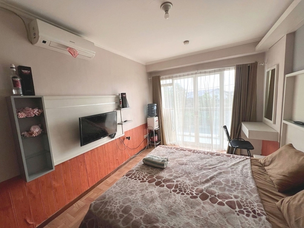 Imagen de la habitación del Hotel OYO 93559 Apartemen Gateway Pasteur By Erik. Foto 13
