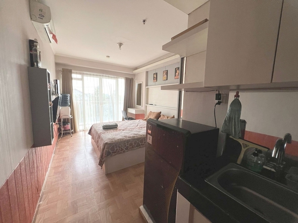 Imagen de la habitación del Hotel OYO 93559 Apartemen Gateway Pasteur By Erik. Foto 14