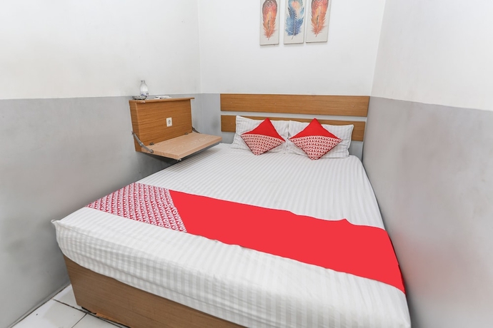 Imagen de la habitación del Hotel OYO 93584 Rukotel. Foto 6