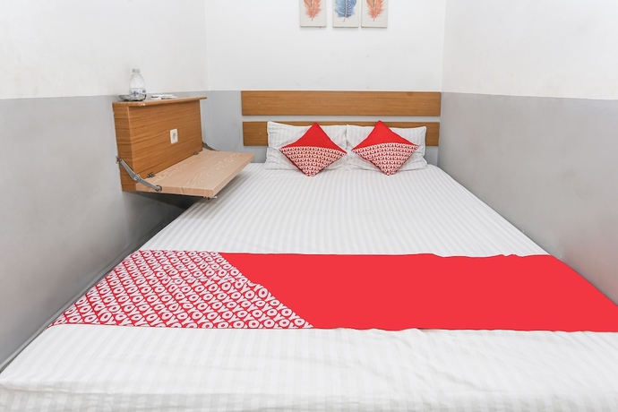 Imagen de la habitación del Hotel OYO 93584 Rukotel. Foto 13
