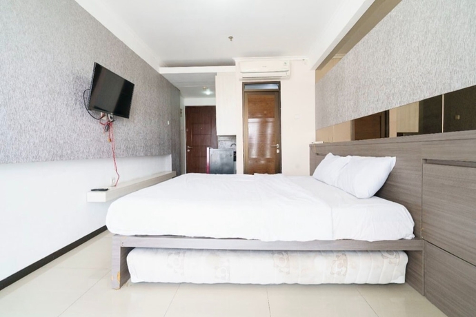 Imagen de la habitación del Hotel OYO 93586 Apartemen Tamansari Panoramic. Foto 5