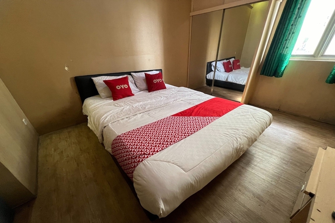 Imagen de la habitación del Hotel OYO 93586 Apartemen Tamansari Panoramic. Foto 6
