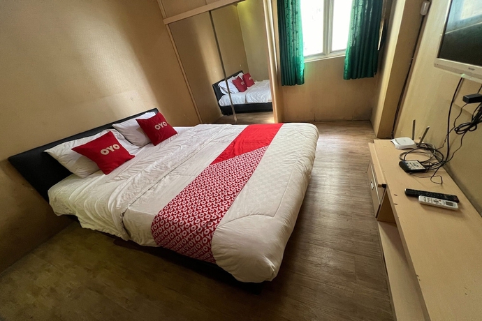 Imagen de la habitación del Hotel OYO 93586 Apartemen Tamansari Panoramic. Foto 7