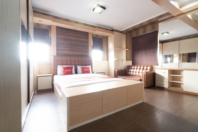 Imagen de la habitación del Hotel OYO 93586 Apartemen Tamansari Panoramic. Foto 11