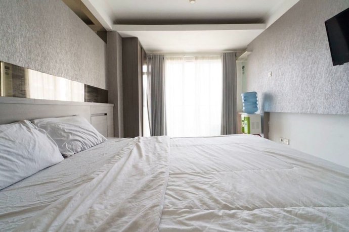 Imagen de la habitación del Hotel OYO 93586 Apartemen Tamansari Panoramic. Foto 13
