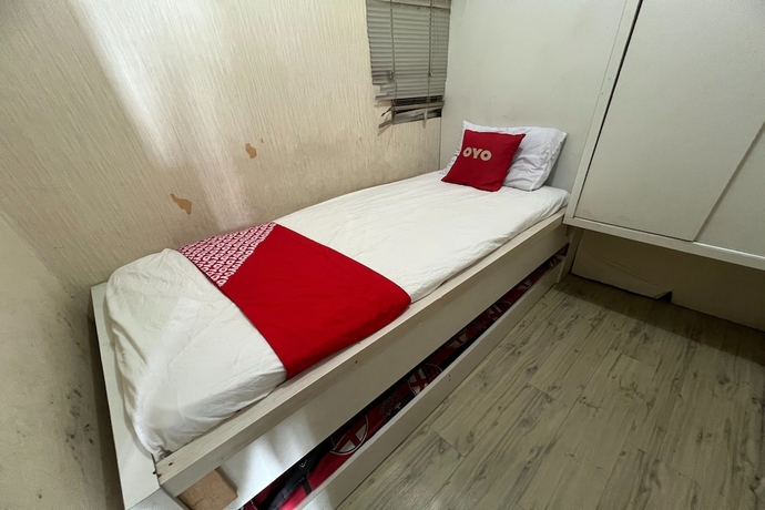 Imagen de la habitación del Hotel OYO 93586 Apartemen Tamansari Panoramic. Foto 14