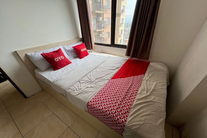 Imagen de la habitación del Hotel OYO 93586 Apartemen Tamansari Panoramic. Foto 15