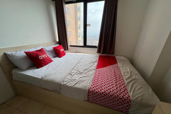 Imagen de la habitación del Hotel OYO 93586 Apartemen Tamansari Panoramic. Foto 16