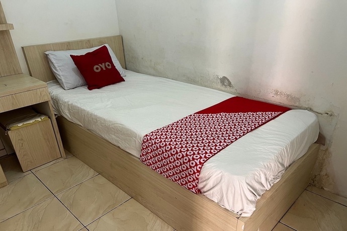 Imagen de la habitación del Hotel OYO 93586 Apartemen Tamansari Panoramic. Foto 17