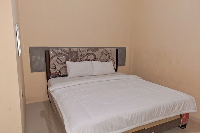 Imagen de la habitación del Hotel OYO 93590 Penginapan Palapa 10. Foto 3