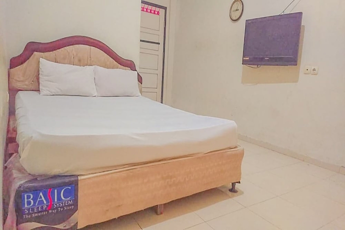 Imagen de la habitación del Hotel OYO 93590 Penginapan Palapa 10. Foto 5