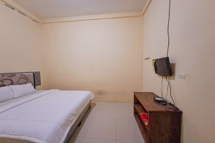 Imagen de la habitación del Hotel OYO 93590 Penginapan Palapa 10. Foto 6