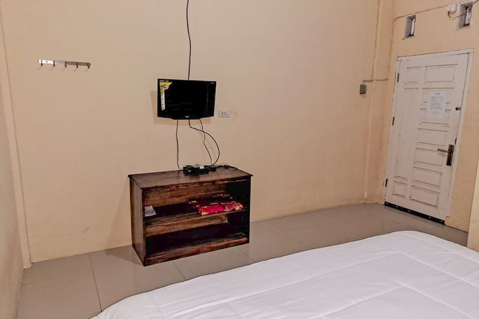 Imagen de la habitación del Hotel OYO 93590 Penginapan Palapa 10. Foto 12