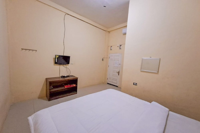 Imagen de la habitación del Hotel OYO 93590 Penginapan Palapa 10. Foto 13