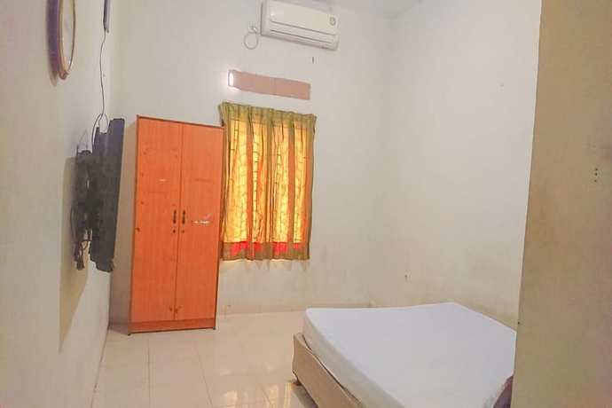 Imagen de la habitación del Hotel OYO 93590 Penginapan Palapa 10. Foto 14