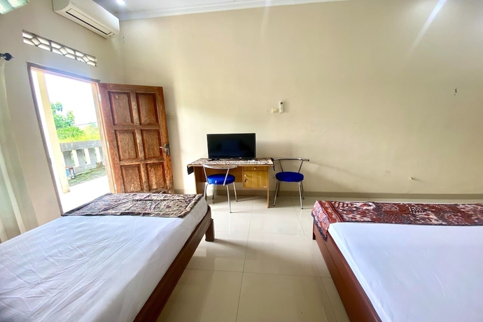 Imagen de la habitación del Hotel OYO 93600 Barong Ijo Homestay Syariah. Foto 7