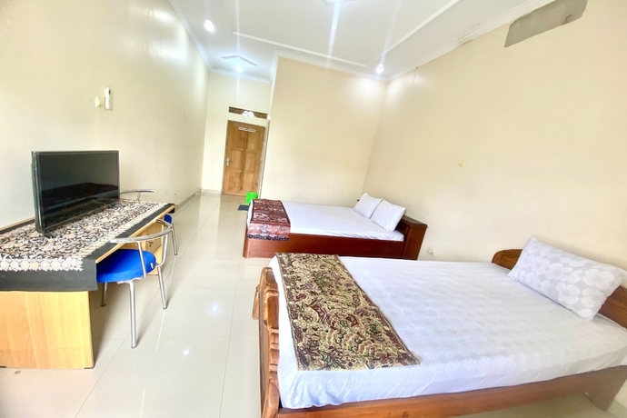 Imagen de la habitación del Hotel OYO 93600 Barong Ijo Homestay Syariah. Foto 8