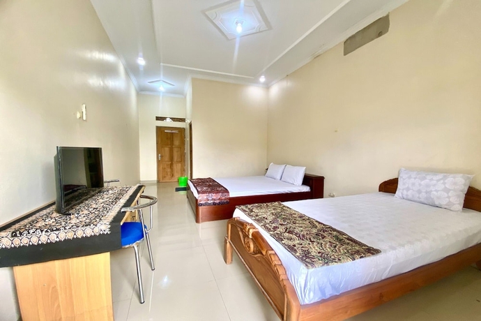 Imagen de la habitación del Hotel OYO 93600 Barong Ijo Homestay Syariah. Foto 11